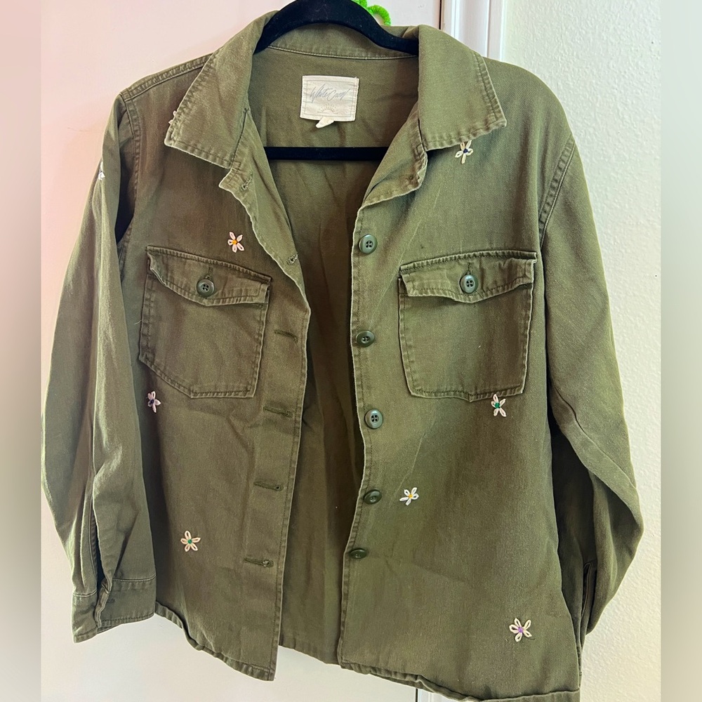 Green jacket with flowers